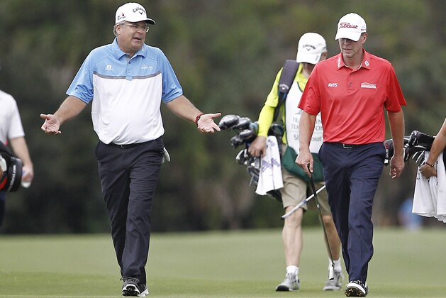 Dec 10, 2015; Naples, FL, USA; Kenny Perry (left) and Steve Stricker walk up to the sixth hole during the first round of the Franklin Templeton Shootout golf match at the Tiburon Golf Club - Gold Course. Mandatory Credit: Reinhold Matay-USA TODAY Sports