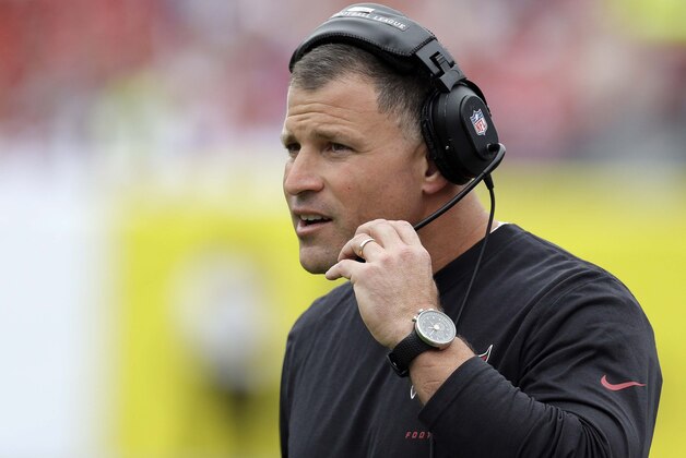 FILE - In a Sunday, Dec. 15, 2013 file photo, Tampa Bay Buccaneers head coach Greg Schiano watches during the first quarter of an NFL football game against the San Francisco 49ers, in Tampa, Fla. The Tampa Bay Buccaneers announced Monday, Dec. 30, 2013 that they have fired coach Greg Schiano and general manager Mark Dominik following a 4-12 finish. (AP Photo/Chris O'Meara, File)