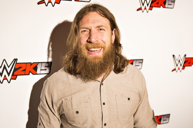 IMAGE DISTRIBUTED FOR 2K - WWE Superstar Daniel Bryan is all smiles at the WWE 2K15 Press Event at Cicada Restaurant, on Saturday, August 16, 2014 in Los Angeles. (Photo by Colin Young-Wolff/Invision for 2K/AP Images)