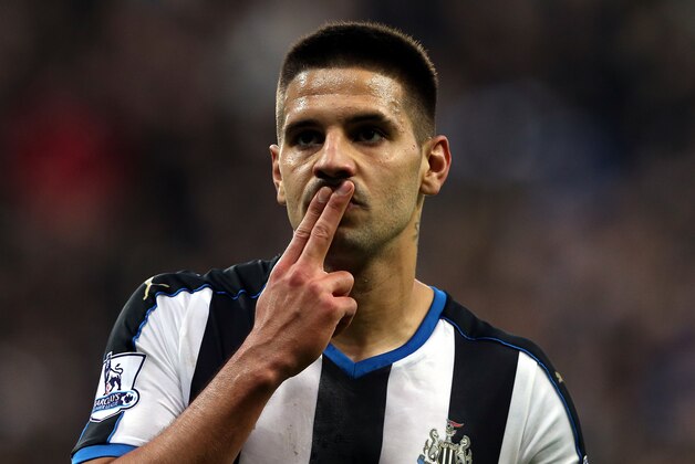 Newcastle United's Aleksandar Mitrovic celebrates his goal during their English Premier League soccer match between Newcastle United and  Norwich City at St James' Park, Newcastle, England, Sunday, Oct. 18, 2015. (AP Photo/Scott Heppell)
