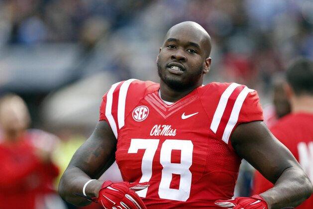 Mississippi offensive lineman Laremy Tunsil (78) loosens up prior to his team's NCAA college football game against Texas A&M in Oxford, Miss., Saturday, Oct. 24, 2015. Tunsil was making his first start for the season having served a seven game suspension. (AP Photo/Rogelio V. Solis)