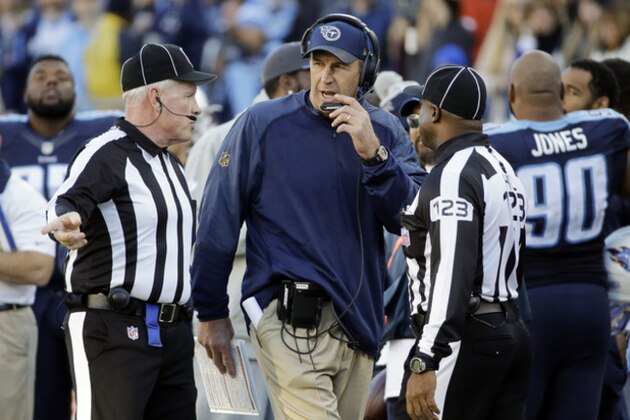Tennessee Titans interim head coach Mike Mularkey talks with officials during an NFL football game against the Jacksonville Jaguars Sunday, Dec. 6, 2015, in Nashville, Tenn. The Titans won 42-39. (AP Photo/James Kenney)