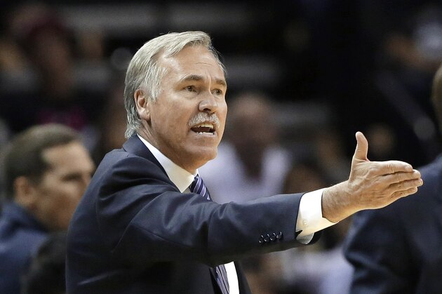 Los Angeles Lakers head coach Mike D'Antoni argues a call during the second half of an NBA basketball game against the San Antonio Spurs, Wednesday, April 16, 2014, in San Antonio. Los Angeles won 113-100. (AP Photo/Eric Gay)