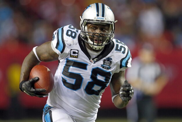 Carolina Panthers outside linebacker Thomas Davis (58) runs with a ball after an interception against the Atlanta Falcons during an NFL football game on Sunday, Dec. 28, 2014 in Atlanta. The Panthers won the game 34-3. (Jeff Haynes/AP Images for Panini)