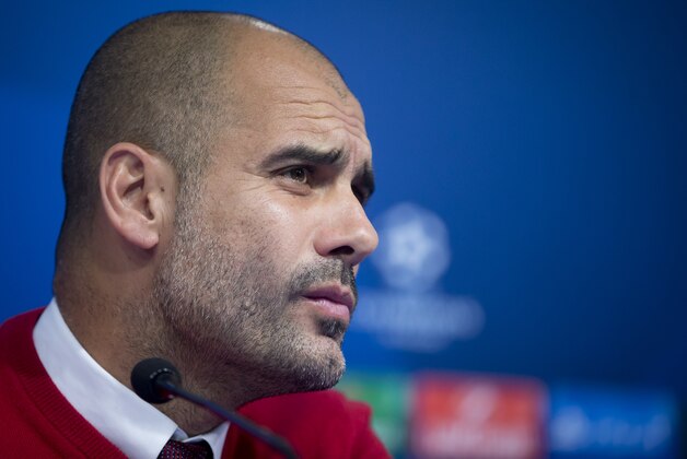 Bayern's head coach Pep Guardiola listens to a question during a press conference ahead of the Champions League Group F soccer match between Dinamo Zagreb and Bayern Munich, in Zagreb, Croatia, Tuesday, Dec. 8, 2015. (AP Photo/Darko Bandic)