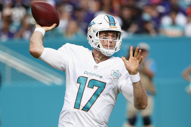 Miami Dolphins quarterback Ryan Tannehill (17) looks to pass during the first half of an NFL football game against the Baltimore Ravens, Sunday, Dec. 6, 2015, in Miami Gardens, Fla. The Dolphins defeated the Ravens 15-13.  (AP Photo/Wilfredo Lee)