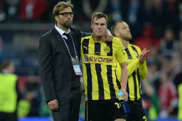 Borussia Dortmund's Head Coach Juergen Klopp (L) and Borussia Dortmund's German midfielder Kevin Grosskreutz react after their defeat in the UEFA Champions League final football match between Borussia Dortmund and Bayern Munich at Wembley Stadium in London on May 25, 2013, Bayern Munich won the game 2-1.   AFP PHOTO / PATRIK STOLLARZ        (Photo credit should read PATRIK STOLLARZ/AFP/Getty Images)