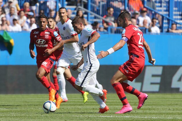 MONTREAL, QC  - AUGUST 1: Marco Verratti of PSG and Maxime Gonalons of Lyon in action during the 2015 Trophee des Champions between Paris Saint-Germain (PSG) and Olympique Lyonnais (OL) at Stade Saputo on August 1, 2015 in Montreal, Quebec, Canada. (Photo by Jean Catuffe/Getty Images)