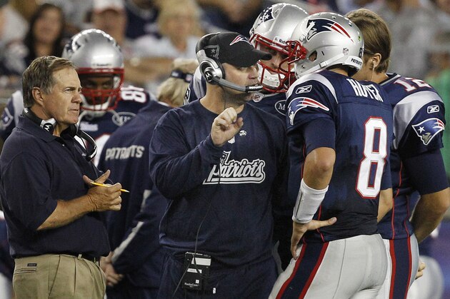 In this photo taken Aug. 11, 2011, New England Patriots offensive coordinator Bill O'Brien, center, talks on the sidelines with quarterbacks Brian Hoyer (8) and Tom Brady (12) as head coach Bill Belichick, left, looks on during the second quarter of an NFL preseason football game against the Jacksonville Jaguars in Foxborough, Mass. O'Brien has agreed to become Penn State's first new head football coach in nearly a half-century. Two people in the NFL with knowledge of the search told The Associated Press on Friday, Jan. 6, 2012, that O'Brien has told them he plans to replace fired coach Joe Paterno. (AP Photo/Elise Amendola)