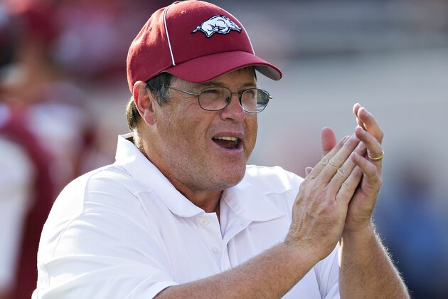 LITTLE ROCK, AR - SEPTEMBER 7:  Offensive Coordinator Jim Chaney of the Arkansas Razorbacks watches the team warm up before a game against the Samford Bulldogs at War Memorial Stadium on September 7, 2013 in Little Rock, Arkansas.  The Razorbacks defeated the Bulldogs 31-21.  (Photo by Wesley Hitt/Getty Images)