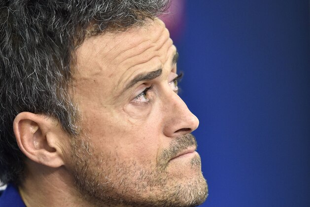 Barcelona's head coach Luis Enrique listens to the media during a press conference prior the Champions League group E soccer match between Bayer Leverkusen and FC Barcelona in Leverkusen, Germany, Tuesday, Dec. 8, 2015. (AP Photo/Martin Meissner)