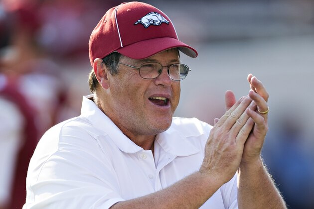 LITTLE ROCK, AR - SEPTEMBER 7:  Offensive Coordinator Jim Chaney of the Arkansas Razorbacks watches the team warm up before a game against the Samford Bulldogs at War Memorial Stadium on September 7, 2013 in Little Rock, Arkansas.  The Razorbacks defeated the Bulldogs 31-21.  (Photo by Wesley Hitt/Getty Images)