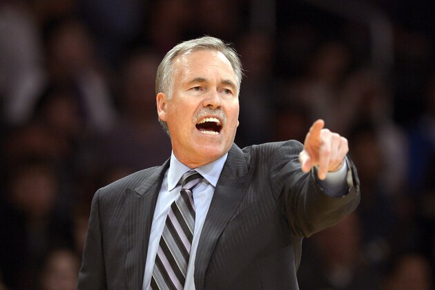 FILE - In this Feb. 28, 2014, file photo, Los Angeles Lakers head coach Mike D'Antoni gestures during the second half of an NBA basketball game against the Sacramento Kings in Los Angeles. Lakers spokesman John Black confirmed D'Antoni's resignation Wednesday, April 30. (AP Photo/Mark J. Terrill, File)