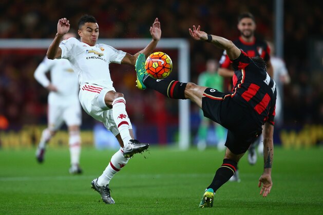 BOURNEMOUTH, ENGLAND - DECEMBER 12: Jesse Lingard of Manchester United and Charlie Daniels of Bournemouth compete for the ball during the Barclays Premier League match between A.F.C. Bournemouth and Manchester United at Vitality Stadium on December 12, 2015 in Bournemouth, United Kingdom. (Photo by Jordan Mansfield/Getty Images) BOURNEMOUTH, ENGLAND - DECEMBER 12: Jesse Lingard of Manchester United and Charlie Daniels of Bournemouth compete for the ball during the Barclays Premier League match between A.F.C. Bournemouth and Manchester United at Vitality Stadium on December 12, 2015 in Bournemouth, United Kingdom. (Photo by Jordan Mansfield/Getty Images)