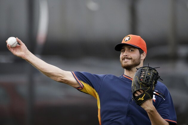 Houston Astros pitcher Mark Appel throws the ball during a spring training baseball workout, Tuesday, Feb. 24, 2015, in Kissimmee, Fla. (AP Photo/David Goldman)