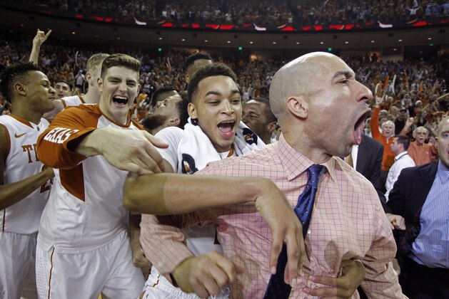 Texas head coach Shaka Smart, right, celebrates his team's last second shot to beat North Carolina during the second half of an NCAA college basketball game, Saturday, Dec. 12, 2015, in Austin, Texas. Texas won 84-82. (AP Photo/Michael Thomas) Texas head coach Shaka Smart, right, celebrates his team's last second shot to beat North Carolina during the second half of an NCAA college basketball game, Saturday, Dec. 12, 2015, in Austin, Texas. Texas won 84-82. (AP Photo/Michael Thomas)