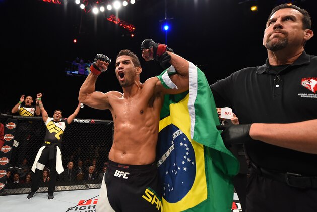 LAS VEGAS, NV - DECEMBER 12:  Leonardo Santos of Brazil reacts to his victory over Kevin Lee in their lightweight bout during the UFC 194 event inside MGM Grand Garden Arena on December 12, 2015 in Las Vegas, Nevada.  (Photo by Josh Hedges/Zuffa LLC/Zuffa LLC via Getty Images)