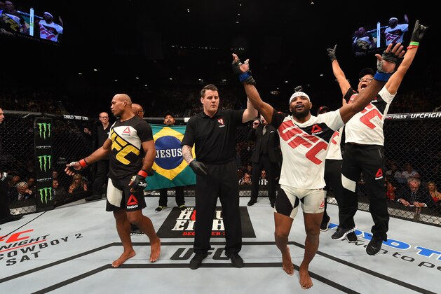 LAS VEGAS, NV - DECEMBER 12: Yoel Romero of Cuba (right) reacts after being declared the winner over Ronaldo 'Jacare' Souza (left) in their middleweight bout during the UFC 194 event inside MGM Grand Garden Arena on December 12, 2015 in Las Vegas, Nevada.  (Photo by Josh Hedges/Zuffa LLC/Zuffa LLC via Getty Images)
