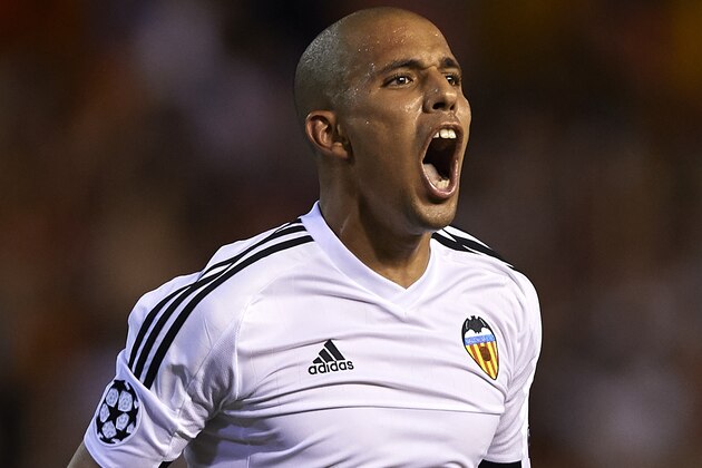 VALENCIA, SPAIN - AUGUST 19:  Sofiane Feghouli of Valencia celebrates scoring his team's third goal during the UEFA Champions League Qualifying Round Play Off First Leg match between Valencia CF and AS Monaco at Mestalla Stadium on August 19, 2015 in Valencia, Spain.  (Photo by Manuel Queimadelos Alonso/Getty Images)
