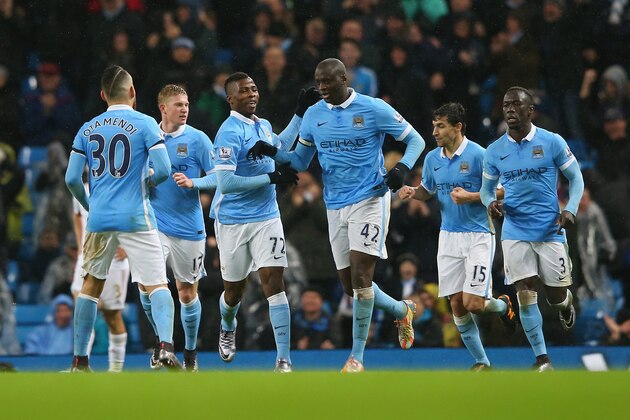 MANCHESTER, ENGLAND - DECEMBER 12:  Yaya Toure (3rd R) of Manchester City celebrates his team's second goal with his team mates during the Barclays Premier League match between Manchester City and Swansea City at Etihad Stadium on December 12, 2015 in Manchester, United Kingdom.  (Photo by Alex Livesey/Getty Images)