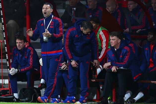 BOURNEMOUTH, ENGLAND - DECEMBER 12: Assistant manager Ryan Giggs of Manchester Untied gestures while manager Louis van Gaal stays on the bench during the Barclays Premier League match between A.F.C. Bournemouth and Manchester United at Vitality Stadium on December 12, 2015 in Bournemouth, United Kingdom.  (Photo by Jordan Mansfield/Getty Images)