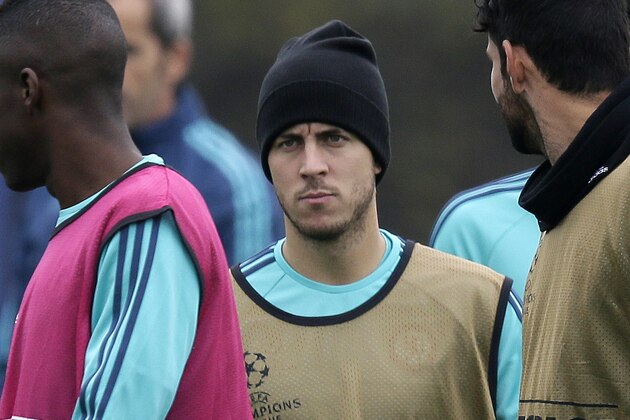 Chelsea's Eden Hazard attends a training session at their training ground in Cobham, England, Tuesday Nov. 3, 2015. Chelsea will play Dynamo Kiev in a Group G Champions League soccer match on Wednesday. (AP Photo/Tim Ireland)