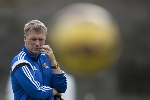 The new Real Sociedad's head manager, David Moyes of Scotland, looks on during his first training session at Zubieta place training of Real Sociedad, near to San Sebastian, northern Spain, Thursday, Nov. 13, 2014. Moyes, the former Manchester United coach is taking over from Jagoba Arrasate, who had earned only one win in 10 matches before being fired. Sociedad is Moyes' first coaching job since being fired by United last season. (AP Photo/Alvaro Barrientos)