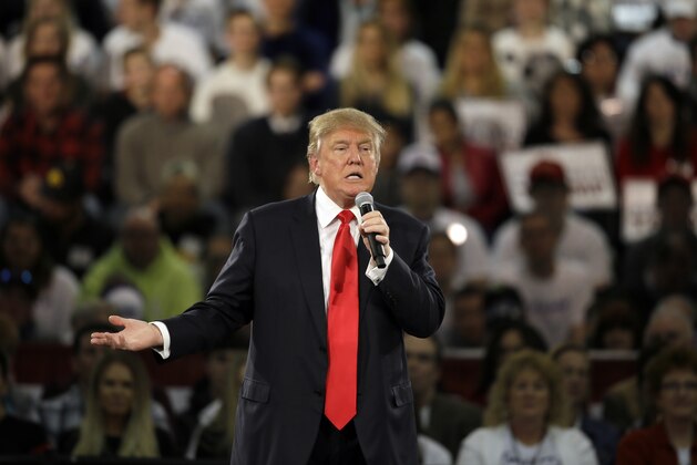 Republican presidential candidate Donald Trump speaks during a campaign rally, Friday, Dec. 11, 2015, in Des Moines, Iowa. (AP Photo/Charlie Neibergall)