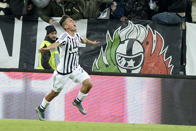 Juventus' Paulo Dybala celebrates after scoring during a Serie A soccer match between AC Milan and Juventus at the Turin Juventus Stadium Saturday, Nov. 21, 2015. (AP Photo/Massimo Pinca)