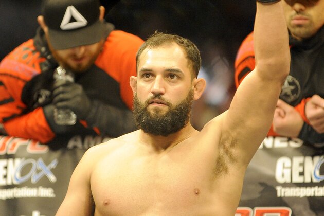 Johny Hendricks is announced to the crowd before a UFC 171 mixed martial arts welterweight title bout, Saturday, March 15, 2014, in Dallas. Hendricks won by decision. (AP Photo/Matt Strasen)