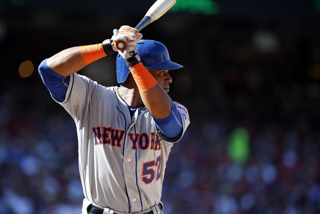 New York Mets center fielder Yoenis Cespedes (52) bats during a baseball game against the Washington Nationals at Nationals Park, Monday, Sept. 7, 2015, in Washington. The Mets won 8-5. (AP Photo/Alex Brandon)