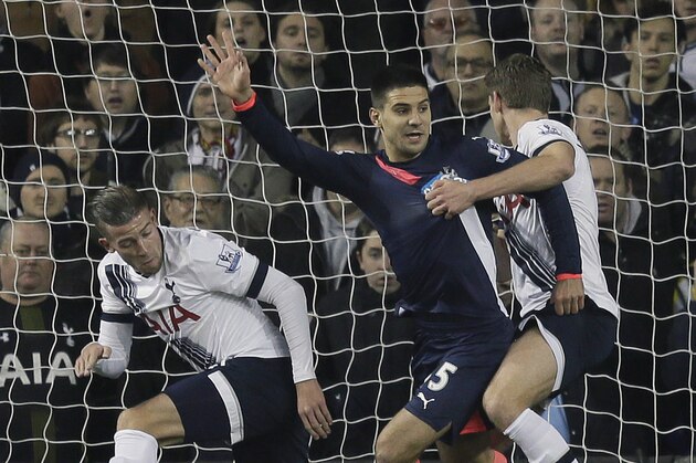 Newcastle’s Aleksandar Mitrovic, centre, scores a goal during the English Premier League soccer match between Tottenham Hotspur and Newcastle United at White Hart Lane in London, Sunday Dec. 13, 2015. (AP Photo/Tim Ireland)