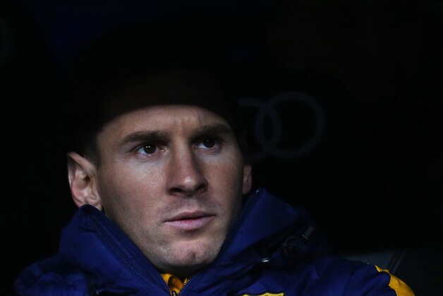 Barcelona's Lionel Messi sits on the bench during the first clasico of the season between Real Madrid and Barcelona at the Santiago Bernabeu stadium in Madrid, Spain, Saturday, Nov. 21, 2015.  (AP Photo/Francisco Seco)