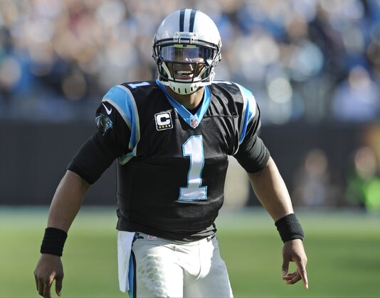 Carolina Panthers' Cam Newton (1) celebrates a touchdown against the Atlanta Falcons in the first half of an NFL football game in Charlotte, N.C., Sunday, Dec. 13, 2015. (AP Photo/Mike McCarn)