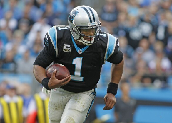 Carolina Panthers' Cam Newton (1) scrambles against the Atlanta Falcons in the second half of an NFL football game in Charlotte, N.C., Sunday, Dec. 13, 2015. (AP Photo/Bob Leverone)