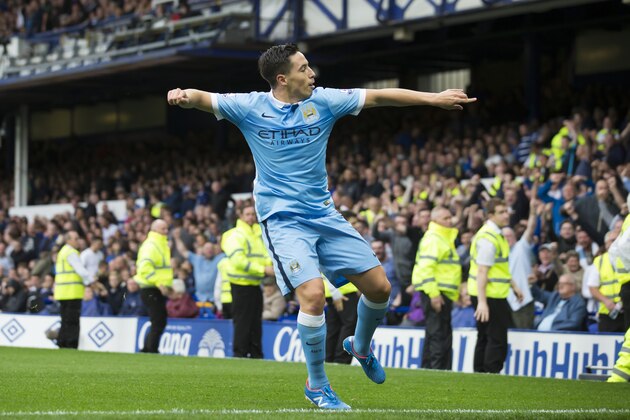 Manchester City's Samir Nasri celebrates after scoring during the English Premier League soccer match between Everton and Manchester City at Goodison Park Stadium, Liverpool, England, Sunday Aug. 23, 2015. (AP Photo/Jon Super)