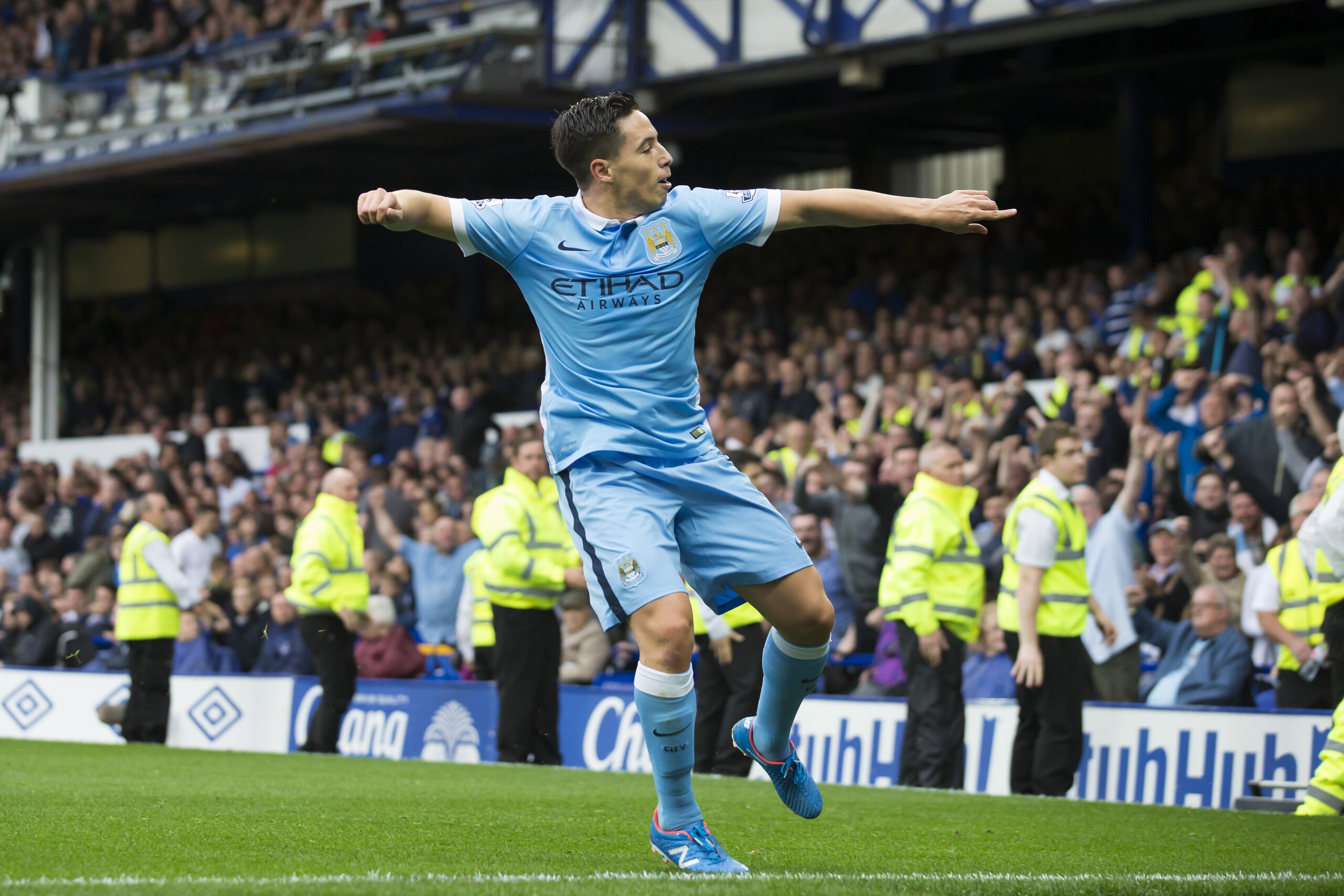 Manchester City's Samir Nasri celebrates after scoring during the English Premier League soccer match between Everton and Manchester City at Goodison Park Stadium, Liverpool, England, Sunday Aug. 23, 2015. (AP Photo/Jon Super)