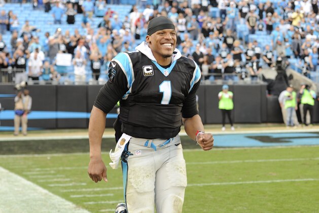 Carolina Panthers' Cam Newton (1) celebrates late in the second half of an NFL football game against the Atlanta Falcons in Charlotte, N.C., Sunday, Dec. 13, 2015. The Panthers won 38-0. (AP Photo/Mike McCarn)