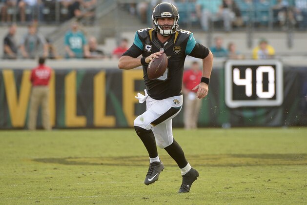 Jacksonville Jaguars quarterback Blake Bortles (5) scrambles as he looks for a receiver against the Indianapolis Colts during the second half of an NFL football game in Jacksonville, Fla., Sunday, Dec. 13, 2015. Jacksonville won 51-16. AP Photo/Phelan M. Ebenhack)