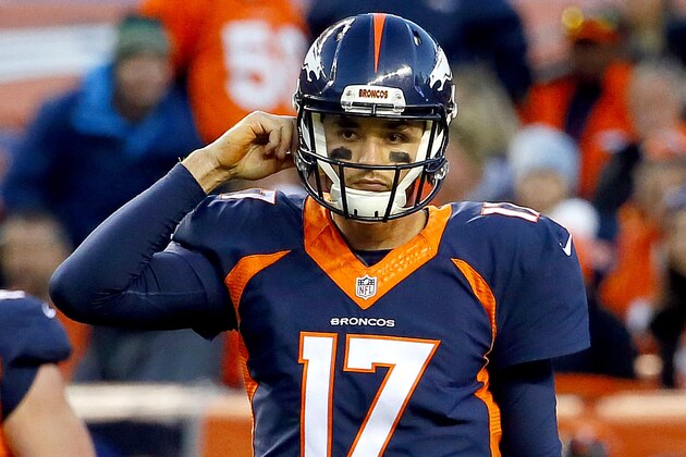 Denver Broncos quarterback Brock Osweiler (17) walks off the field after having the ball stripped by the  Oakland Raiders in the end zone for a safety during the second half of an NFL football game, Sunday, Dec. 13, 2015, in Denver. (AP Photo/Jack Dempsey)