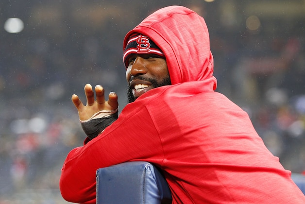 St. Louis Cardinals Jason Heyward waves to fans from the dugout in the seventh inning of a baseball game against the Atlanta Braves, Friday, Oct. 2, 2015, in Atlanta. (AP Photo/Todd Kirkland)