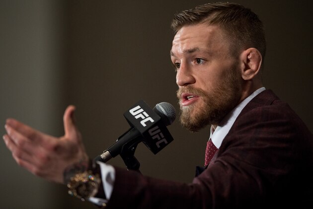 LAS VEGAS, NV - DECEMBER 12:  UFC featherweight champion Conor McGregor speaks to the media at the post fight press conference after his 13 second knockout victory over Jose Aldo in their featherweight championship fight during the UFC 194 event inside MGM Grand Garden Arena on December 12, 2015 in Las Vegas, Nevada.  (Photo by Brandon Magnus/Zuffa LLC/Zuffa LLC via Getty Images)