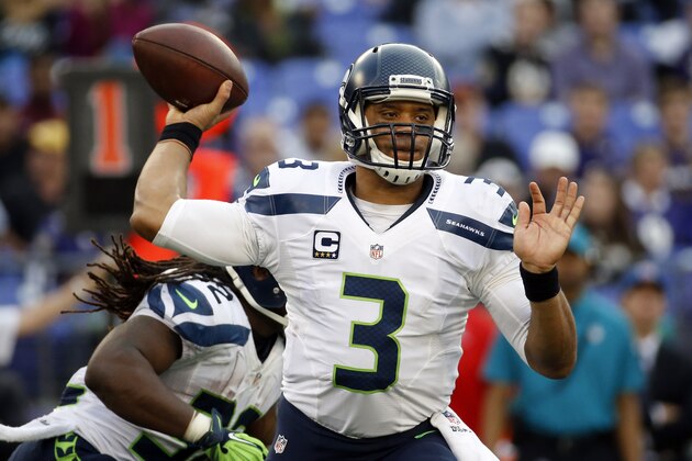 Seattle Seahawks quarterback Russell Wilson (3) looks to pass during the second half an NFL football game against the Baltimore Ravens, Sunday, Dec. 13, 2015, in Baltimore. (AP Photo/Patrick Semansky)
