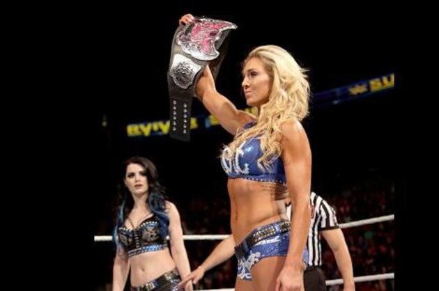 CLEVELAND, OH - JULY 22:  (L-R) Summer Rae and Paige of WWE and Kevin Skaff of A Day To Remember attend the 2015 Journeys AP Music Awards, Fueled by Monster Energy Drink at Quicken Loans Arena on July 22, 2015 in Cleveland, Ohio.  (Photo by Duane Prokop/Getty Images)