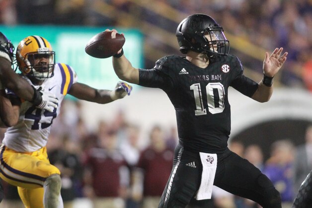 Nov 28, 2015; Baton Rouge, LA, USA; Texas A&M Aggies quarterback Kyle Allen (10) looks to pass the ball against the LSU Tigers during the second half at Tiger Stadium. LSU defeated Texas A&M Aggies 19-7. Mandatory Credit: Crystal LoGiudice-USA TODAY Sports