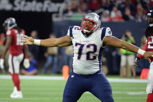 New England Patriots defensive end Akiem Hicks (72) celebrates after he sacked Houston Texans quarterback Brian Hoyer during the second half of an NFL football game Sunday,  Dec. 13, 2015, in Houston. (AP Photo/George Bridges)