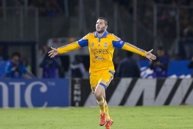 Tigres' Andre Gignac, celebrates after scoring against Pumas during the final match of the Mexican soccer league in Mexico City, Sunday, Dec. 13, 2015. (AP Photo/Eduardo Verdugo)