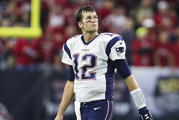 Dec 13, 2015; Houston, TX, USA; New England Patriots quarterback Tom Brady (12) walks off the field after a play during the second quarter against the Houston Texans at NRG Stadium. Mandatory Credit: Troy Taormina-USA TODAY Sports
