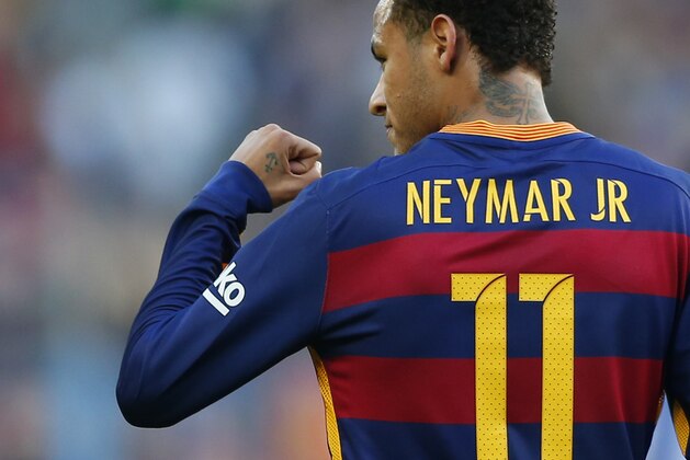 FC Barcelona's Neymar reacts after scoring against Real Sociedad during a Spanish La Liga soccer match at the Camp Nou stadium in Barcelona, Spain, Saturday, Nov. 28, 2015. (AP Photo/Manu Fernandez)