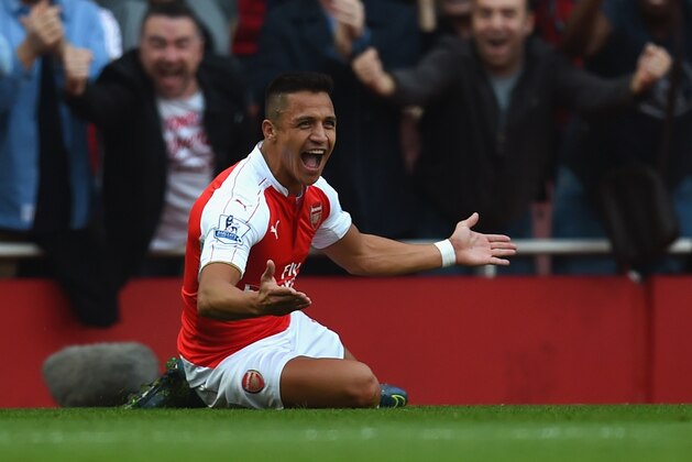 LONDON, ENGLAND - OCTOBER 04: Alexis Sanchez of Arsenal celebrates scoring their third goal during the Barclays Premier League match between Arsenal and Manchester United at Emirates Stadium on October 4, 2015 in London, England. (Photo by Michael Regan/Getty Images) LONDON, ENGLAND - OCTOBER 04: Alexis Sanchez of Arsenal celebrates scoring their third goal during the Barclays Premier League match between Arsenal and Manchester United at Emirates Stadium on October 4, 2015 in London, England. (Photo by Michael Regan/Getty Images)